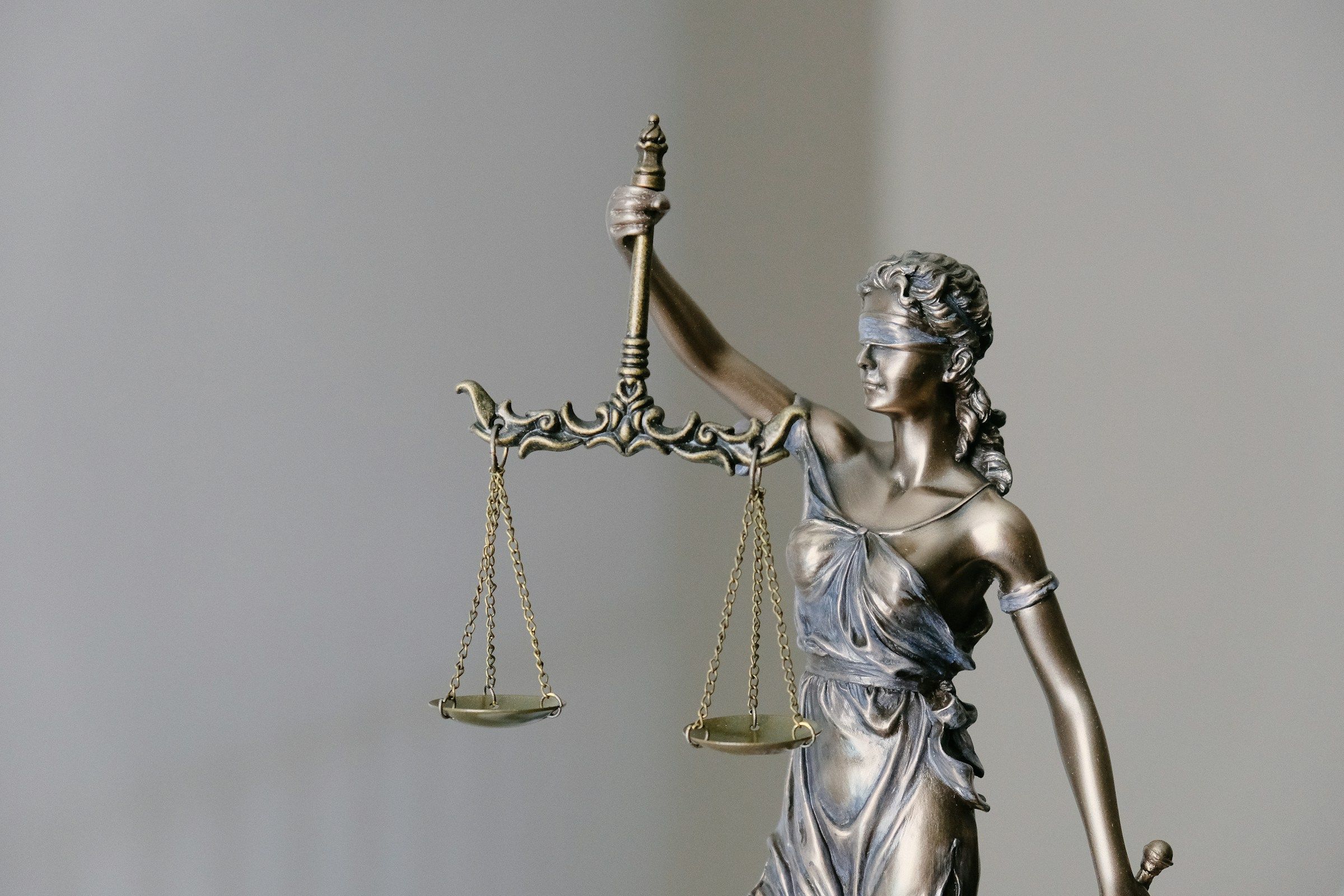 Lady Justice statue with scales and sword