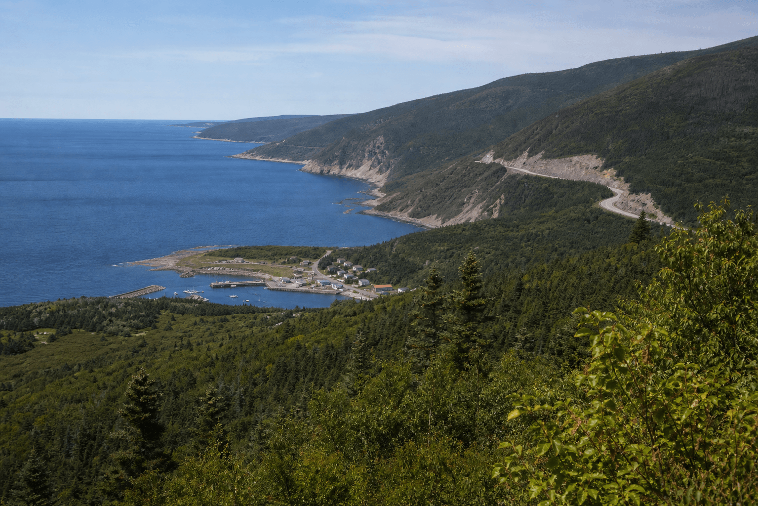 Nova Scotia coastal travel scenery with cliffs, ocean, and maritime towns