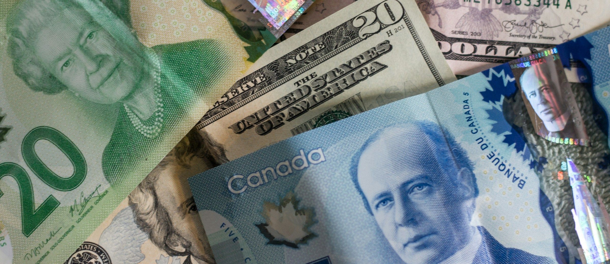 A collection of banknotes in assorted denominations