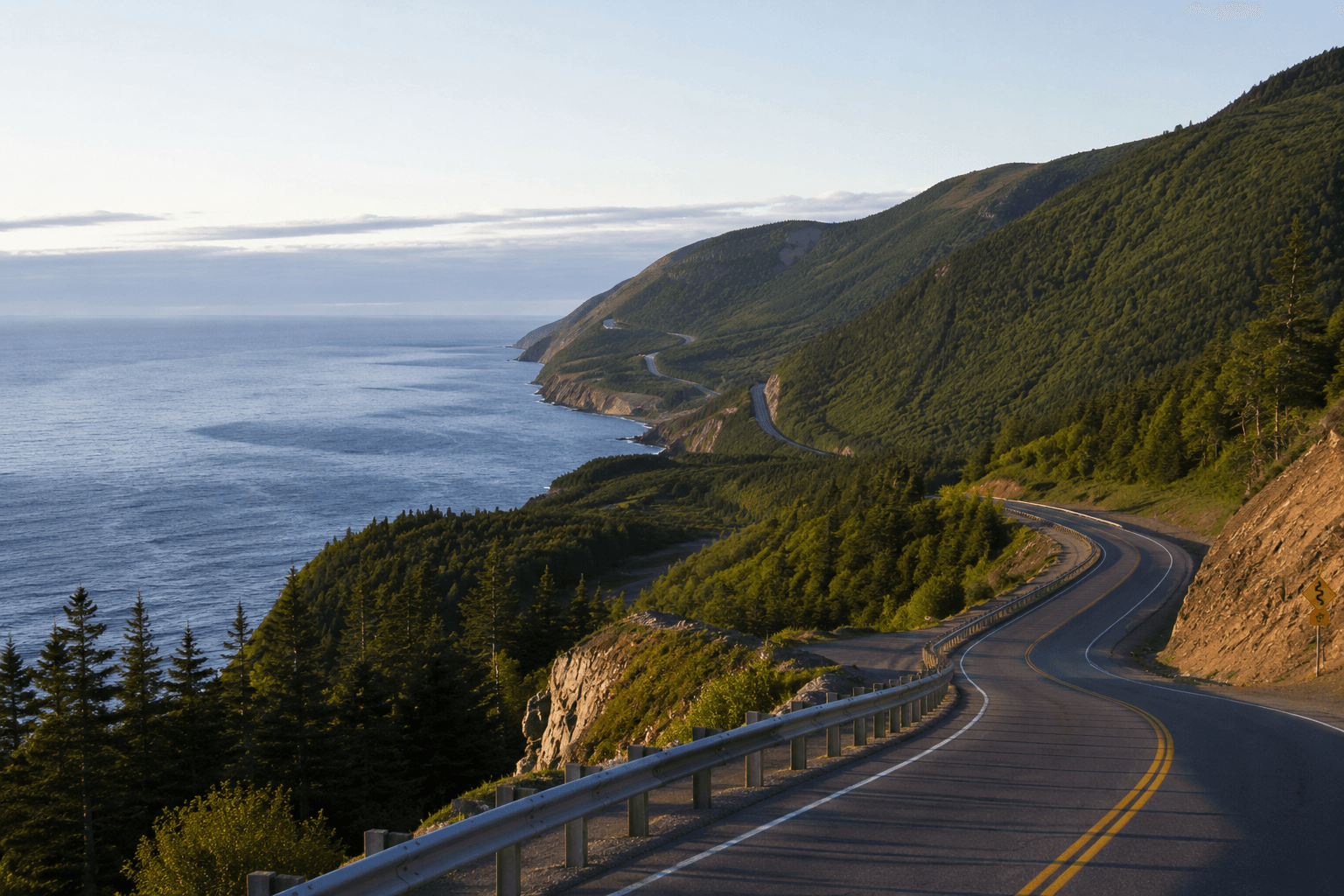 Cabot Trail road curving along the Cape Breton coast in Nova Scotia