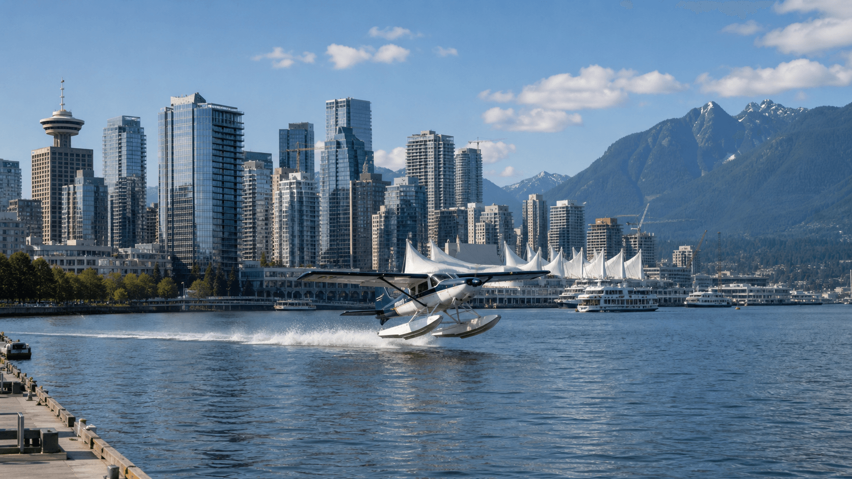Harbour Air seaplane panorama over city, ocean and mountains