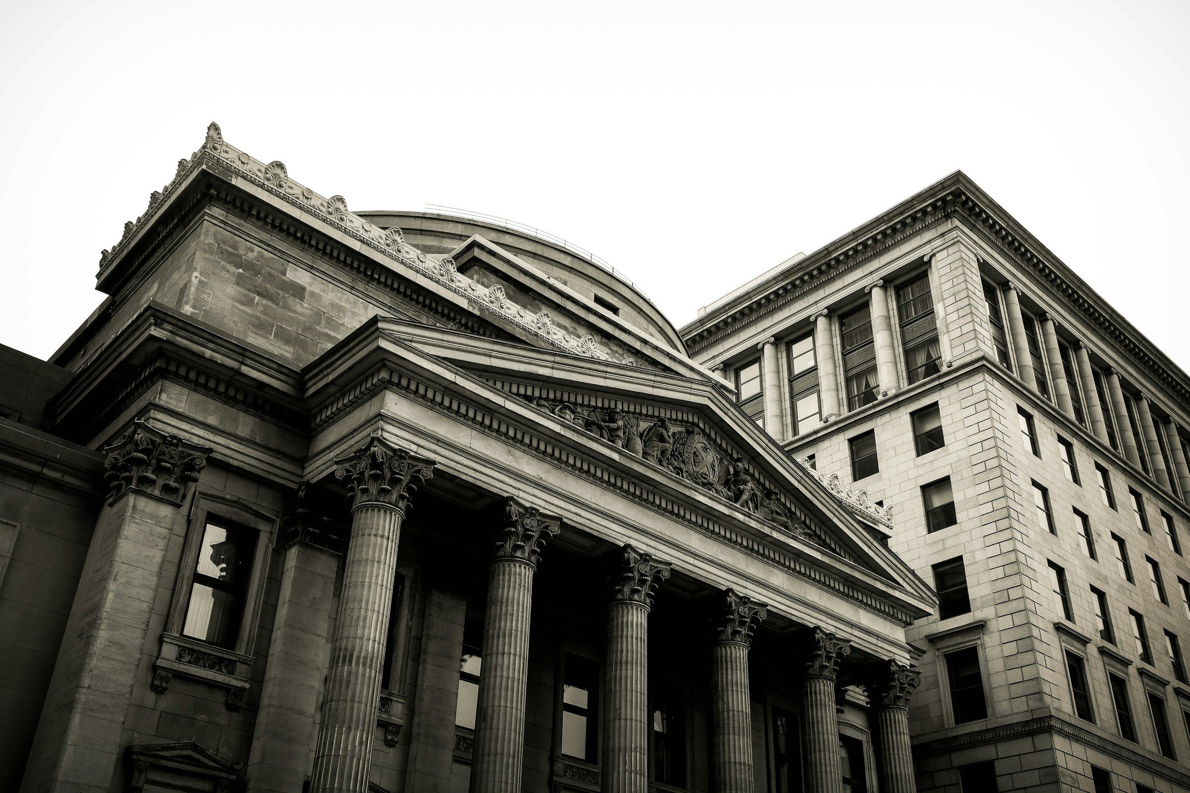 Grey concrete building with classical columns in Montreal